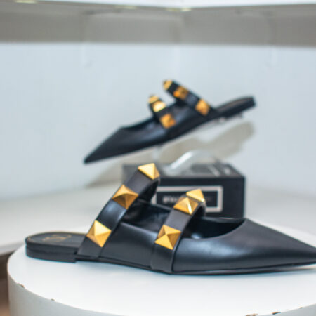 Valentino Garavani Roman Stud Leather Flat Mules.